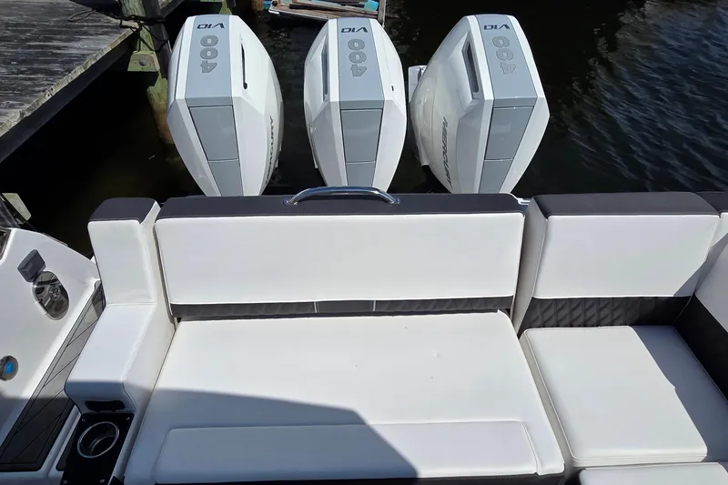 Slide: The Image of 2024 Monterey 385SS Super Sport boat with triple 400 horsepower engines. - 11