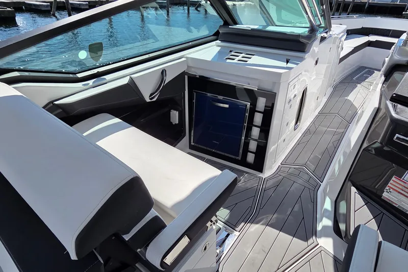 Slide: The Image of 2024 Monterey 385SS Super Sport boat interior with sleek seating and modern design. - 13