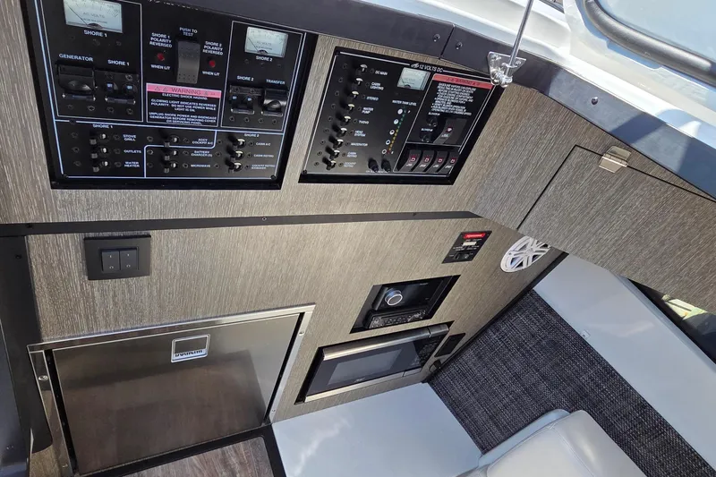Slide: The Image of 2024 Monterey 385SS Super Sport control panel with switches and modern interior design. - 16