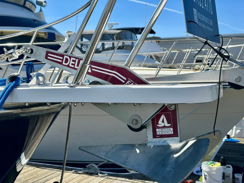 Slide: The Image of 1997 Sabre Cockpit Motor Yacht with Delta anchor at marina. - 41