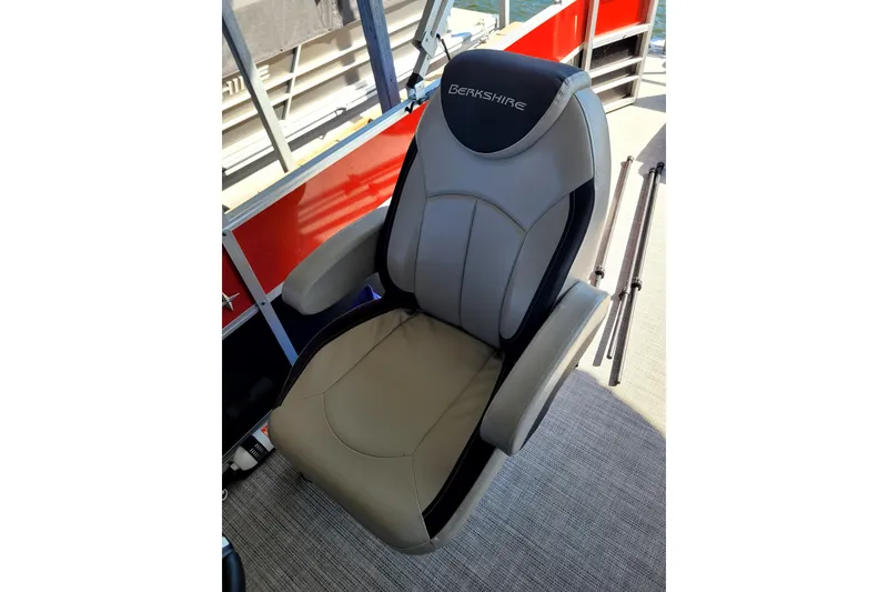 Slide: The Image of 2023 Berkshire 24CL LE 2.75 boat seat, beige and black, with armrests. - 10
