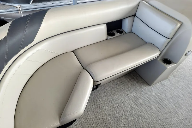 Slide: The Image of 2023 Berkshire 24CL LE 2.75 boat interior seating with cup holders. - 5