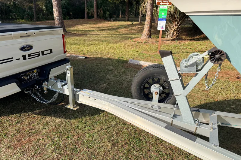 Slide: The Image of Ford F-150 towing a 2022 Sea Fox 228 Commander boat on a trailer. - 15