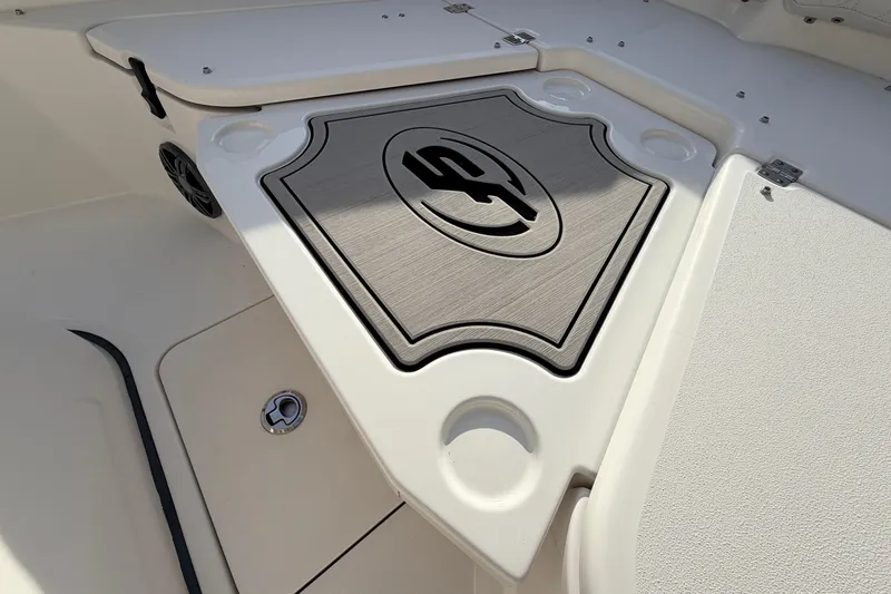 Slide: The Image of 2022 Sea Fox 228 Commander boat deck with logo and cup holders. - 19