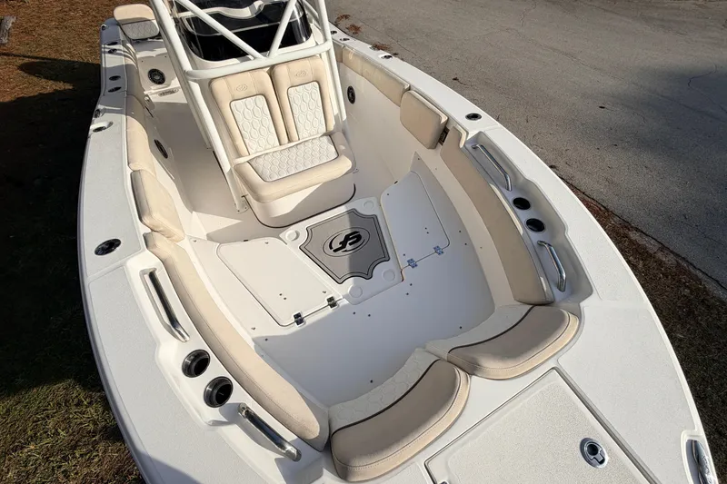 Slide: The Image of 2022 Sea Fox 228 Commander boat interior with cushioned seating and storage compartments. - 20