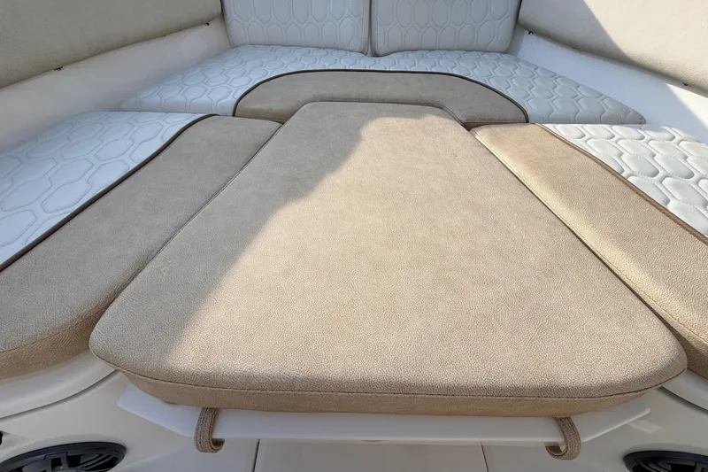 Slide: The Image of 2022 Sea Fox 228 Commander boat interior with beige cushioned seating. - 28