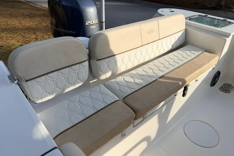 Slide: The Image of 2022 Sea Fox 228 Commander boat seating with beige and white upholstery. - 72