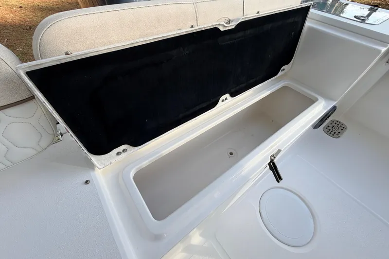 Slide: The Image of Open storage compartment on 2022 Sea Fox 228 Commander boat. - 75