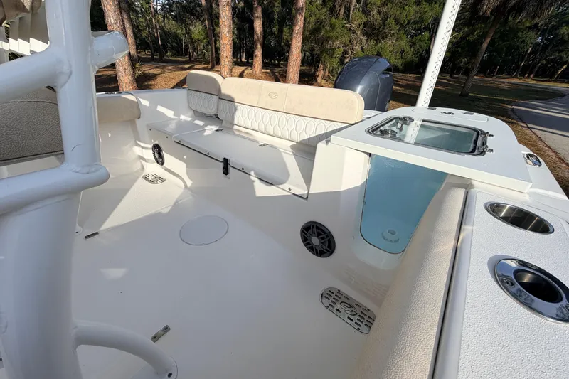 Slide: The Image of 2022 Sea Fox 228 Commander boat interior with seating and storage compartments. - 76