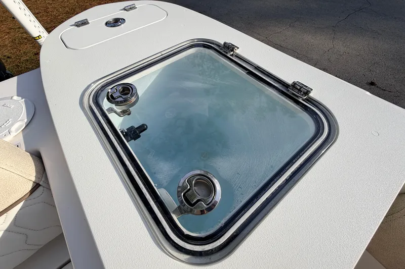 Slide: The Image of 2022 Sea Fox 228 Commander boat hatch with secure latches and clear window. - 78