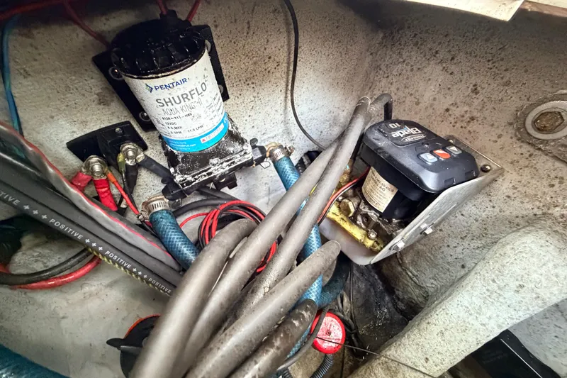 Slide: The Image of Bilge area of 2022 Sea Fox 228 Commander with Shurflo pump and wiring. - 83