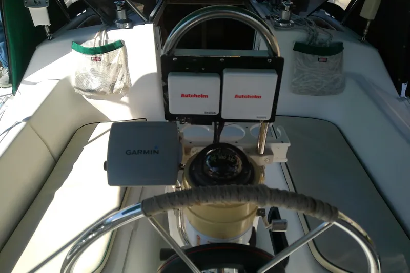 Slide: The Image of Cockpit of 1991 Hunter 30 sailboat with Garmin and Autohelm equipment. - 16