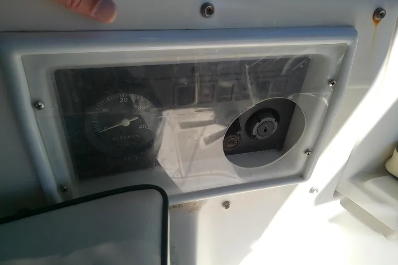 Slide: The Image of Instrument panel of a 1991 Hunter 30 boat with gauge and controls. - 18