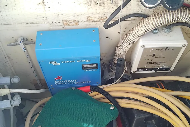Slide: The Image of Victron Energy Centaur battery charger in 1991 Hunter 30 boat engine compartment. - 20