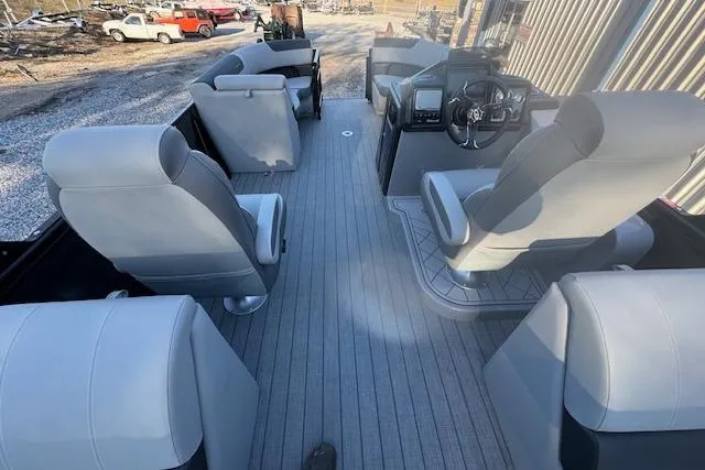 Slide: The Image of 2026 Veranda Relax VR 22 RC pontoon boat interior with modern seating and steering console. - 12