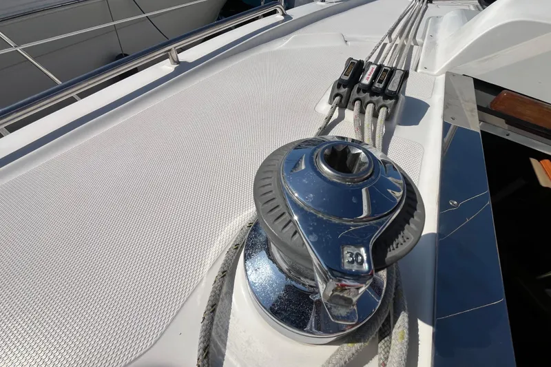 Slide: The Image of Close-up of a 2008 Hunter 36 sailboat winch and rope system on deck. - 19