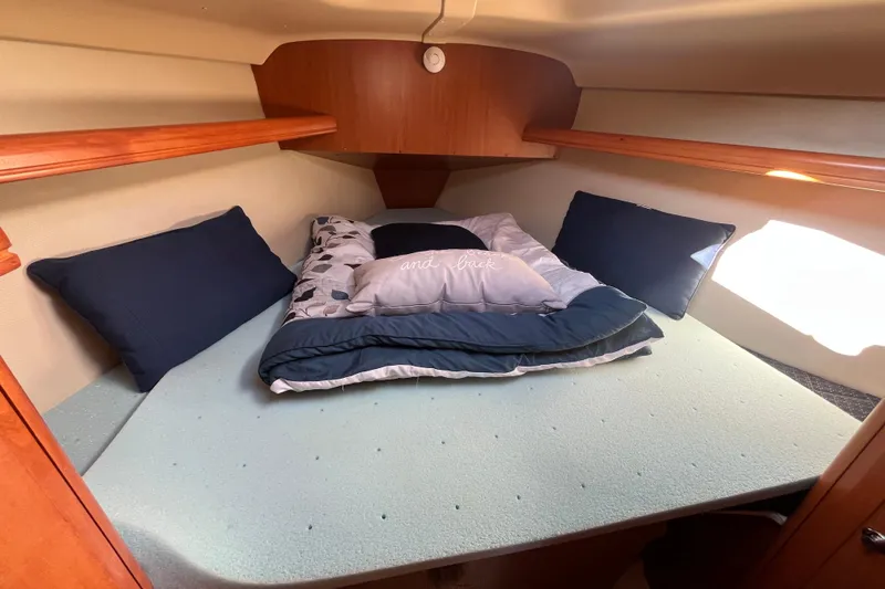 Slide: The Image of Cozy cabin interior of 2008 Hunter 36 sailboat with comfortable bedding. - 35