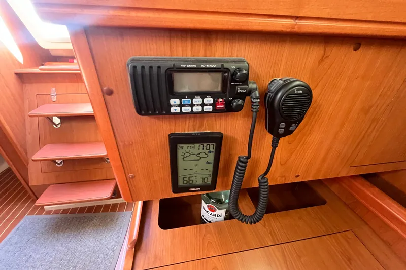 Slide: The Image of 2008 Hunter 36 yacht interior with VHF marine radio and digital display. - 44