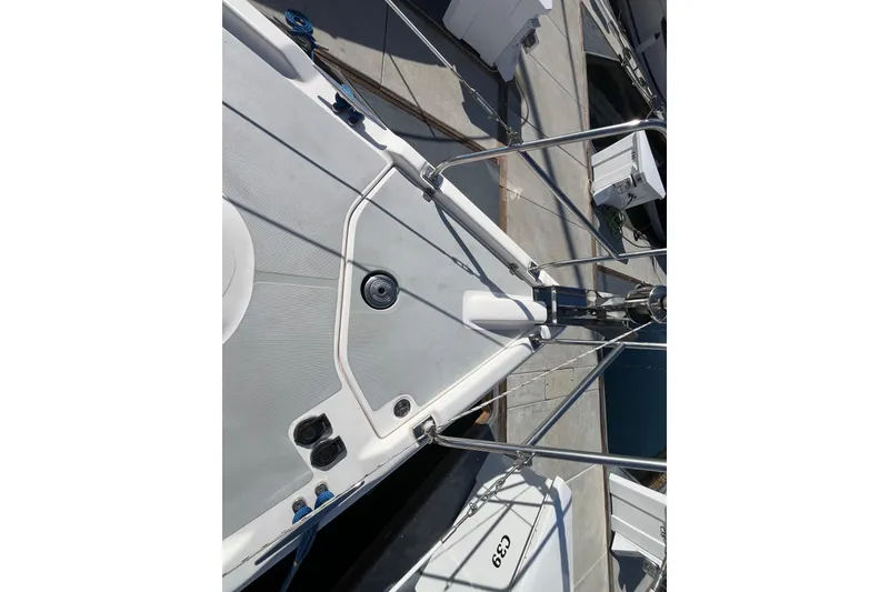 Slide: The Image of 2008 Hunter 36 sailboat deck with stainless steel railings and fittings. - 9