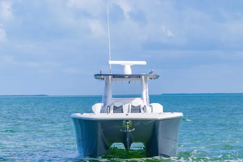 Slide: The Image of 2023 Invincible 35 Catamaran on open water, showcasing sleek design and modern features. - 5