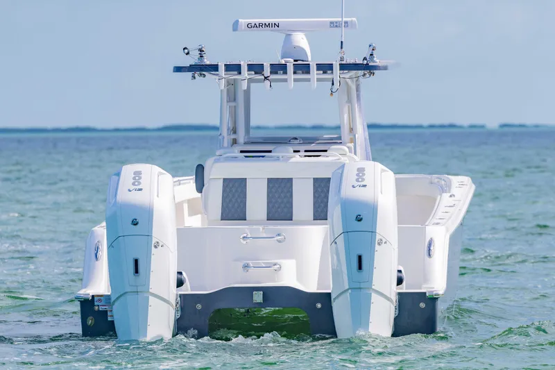 Slide: The Image of 2023 Invincible 35 Catamaran with twin engines on open water. - 7