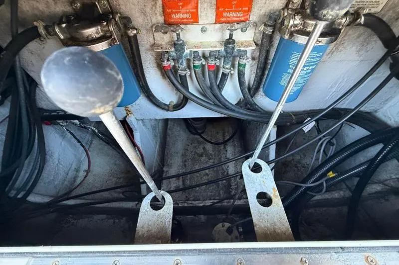 Slide: The Image of 2007 Grady-White Bimini 306 boat controls and wiring system. - 14