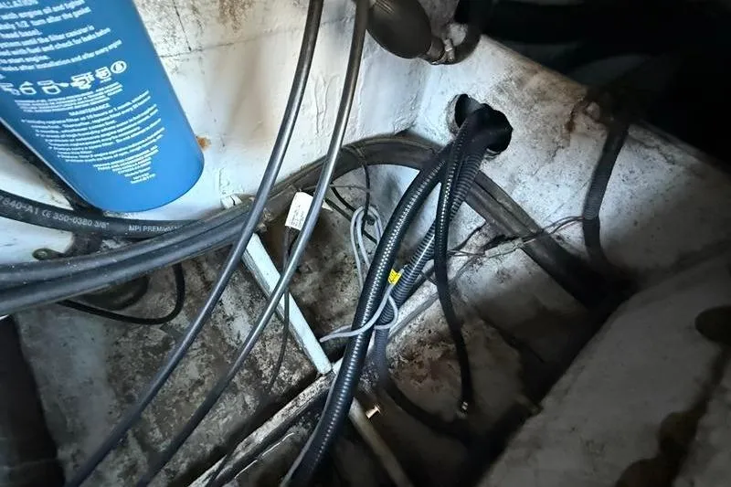 Slide: The Image of 2007 Grady-White Bimini 306 boat wiring and cables in engine compartment. - 15