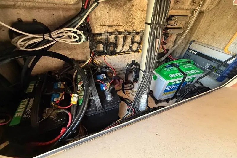 Slide: The Image of Electrical system of a 2007 Grady-White Bimini 306 boat with batteries and wiring. - 37