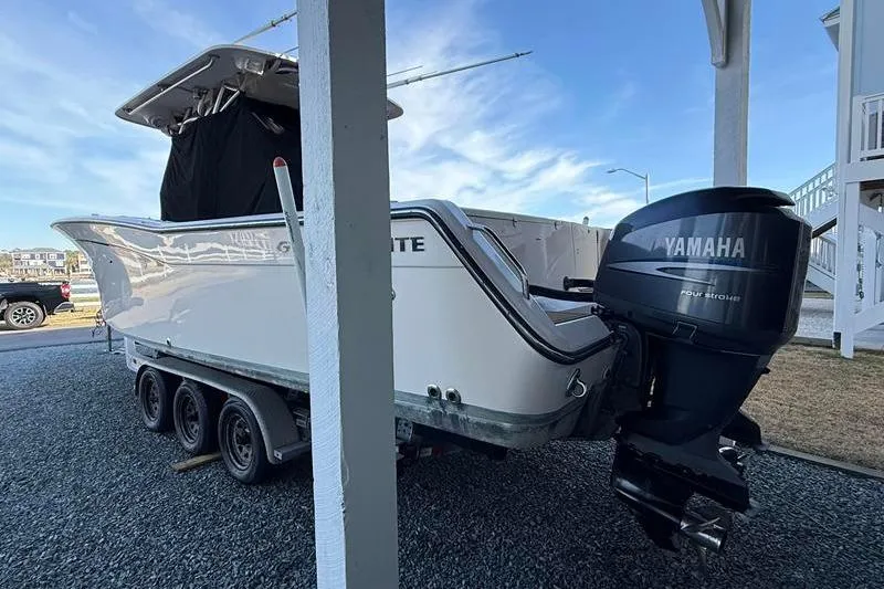 Slide: The Image of 2007 Grady-White Bimini 306 boat with Yamaha outboard motor on trailer. - 4