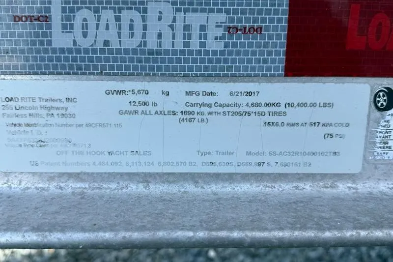 Slide: The Image of LoadRite trailer label with specifications and manufacturing details, dated June 21, 2017. - 43