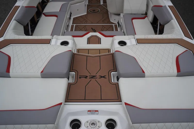 Slide: The Image of 2022 Tigé 22RZX boat interior with luxurious seating and stylish design. - 21