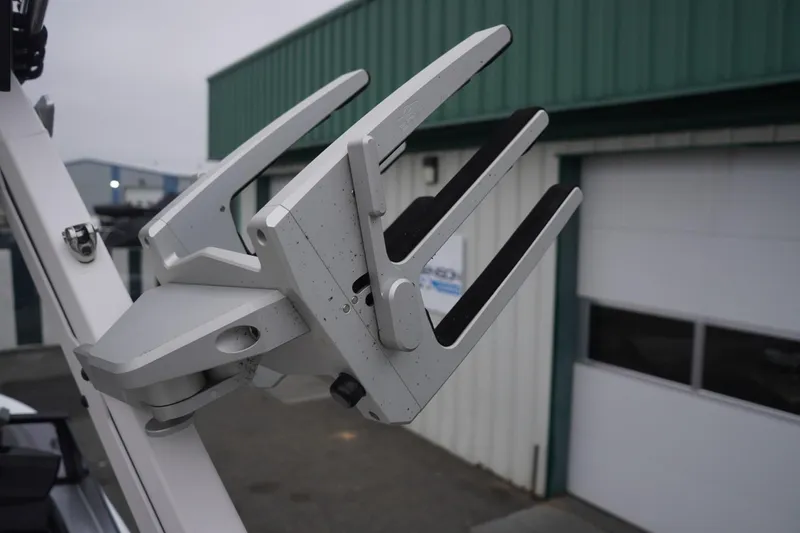 Slide: The Image of Wakeboard rack on 2022 Tigé 22RZX boat, close-up view. - 31