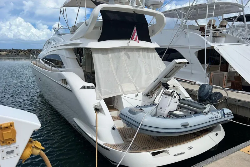 Slide: The Image of Luxury 2007 Aicon 56 yacht docked with inflatable boat on deck. - 4