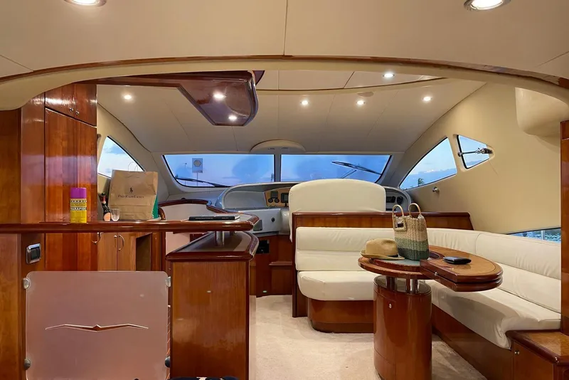 Slide: The Image of Luxurious interior of 2007 Aicon 56 yacht with elegant wood and leather furnishings. - 5