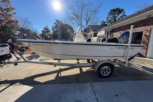 The Image of 2021 Key West 188 Bay Reef boat on trailer in sunny driveway. - 0