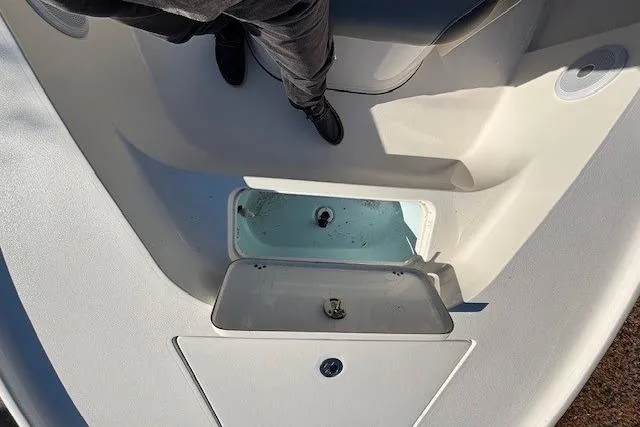 Slide: The Image of 2021 Key West 188 Bay Reef boat on trailer in residential driveway. - 20