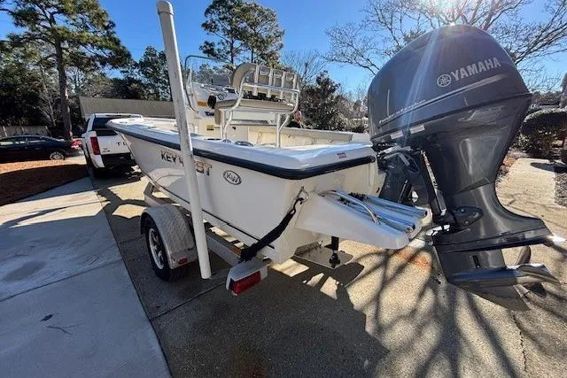 Slide: The Image of 2021 Key West 188 Bay Reef boat on trailer in residential driveway. - 3