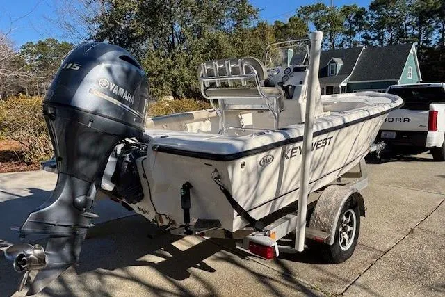 Slide: The Image of 2021 Key West 188 Bay Reef boat with Yamaha outboard motor on a trailer. - 6