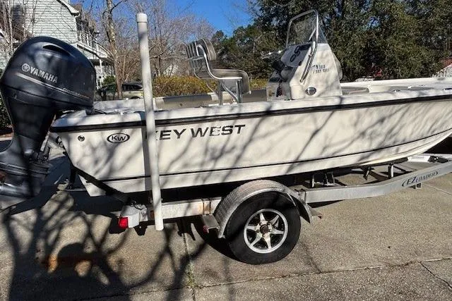 Slide: The Image of 2021 Key West 188 Bay Reef boat on trailer with Yamaha outboard motor. - 7