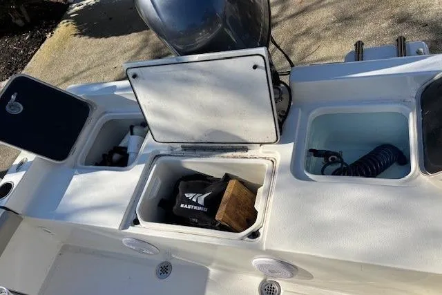 Slide: The Image of 2021 Key West 188 Bay Reef boat on EZ Loader trailer in driveway. - 9