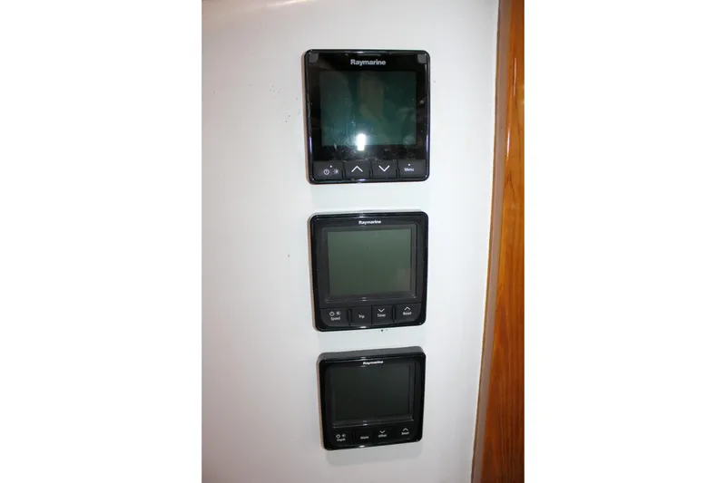 Slide: The Image of Three Raymarine marine displays on a 1981 Bristol 40 yacht. - 20