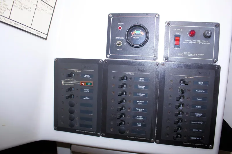 Slide: The Image of Control panel of a 1981 Bristol 40 yacht with various switches and indicators. - 52