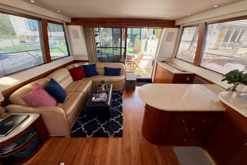 Slide: The Image of Luxurious interior of 1999 Carver 530 Voyager Pilothouse with elegant seating and decor. - 106