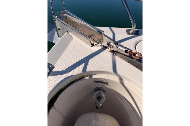 Slide: The Image of Anchor chain and deck details of 1999 Carver 530 Voyager Pilothouse boat. - 18