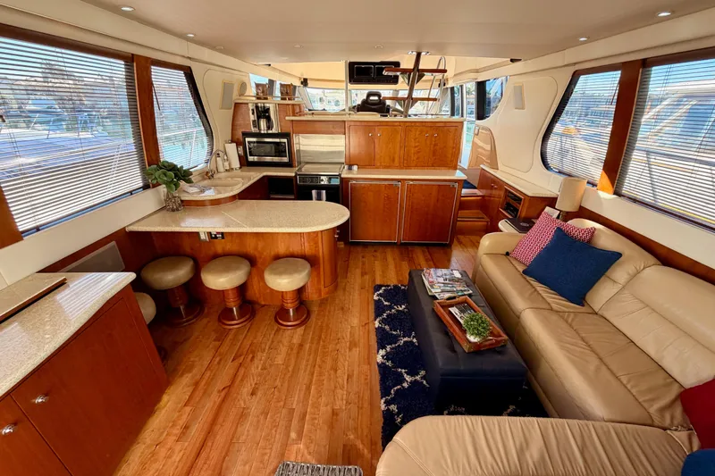 Slide: The Image of Luxurious interior of a 1999 Carver 530 Voyager Pilothouse yacht with modern amenities. - 25