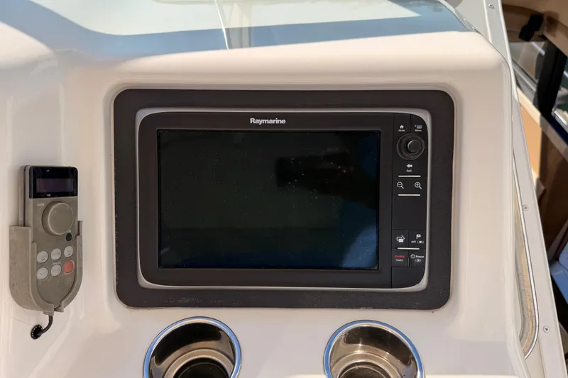 Slide: The Image of Raymarine navigation system on 1999 Carver 530 Voyager Pilothouse yacht dashboard. - 54