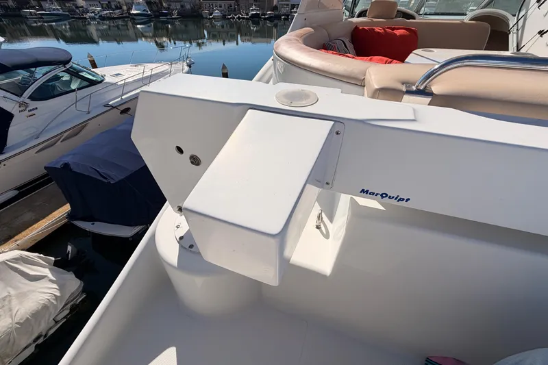 Slide: The Image of 1999 Carver 530 Voyager Pilothouse yacht with MarQuipt boarding ladder at marina. - 66