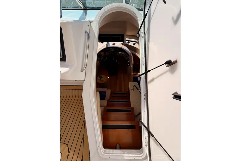 Slide: The Image of Stairway leading to the interior of a 1999 Carver 530 Voyager Pilothouse yacht. - 69
