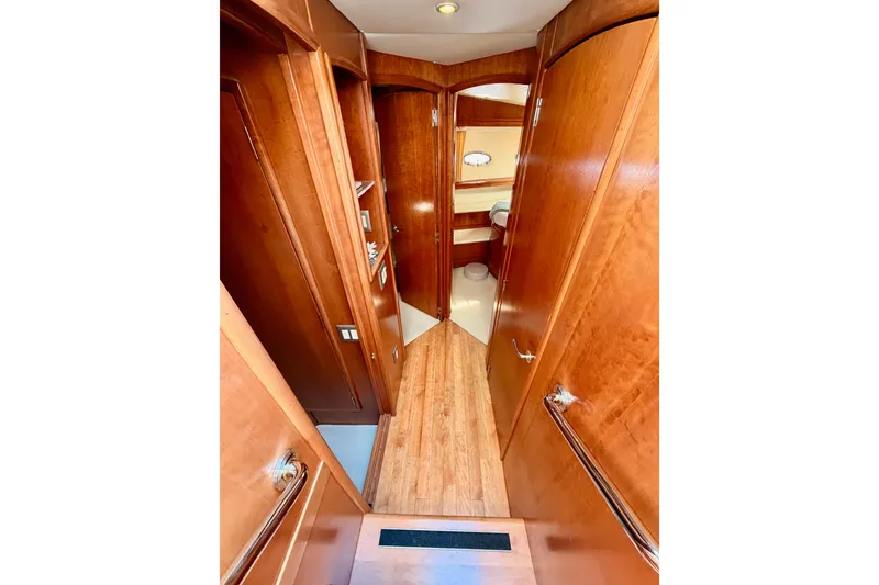 Slide: The Image of Interior hallway of 1999 Carver 530 Voyager Pilothouse with wooden finish. - 73
