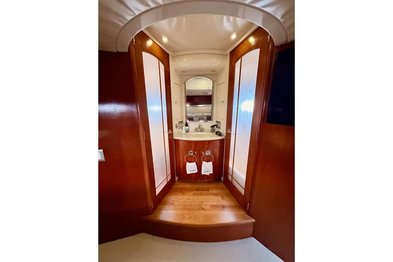 Slide: The Image of Luxurious bathroom interior of 1999 Carver 530 Voyager Pilothouse yacht with wooden finishes. - 95
